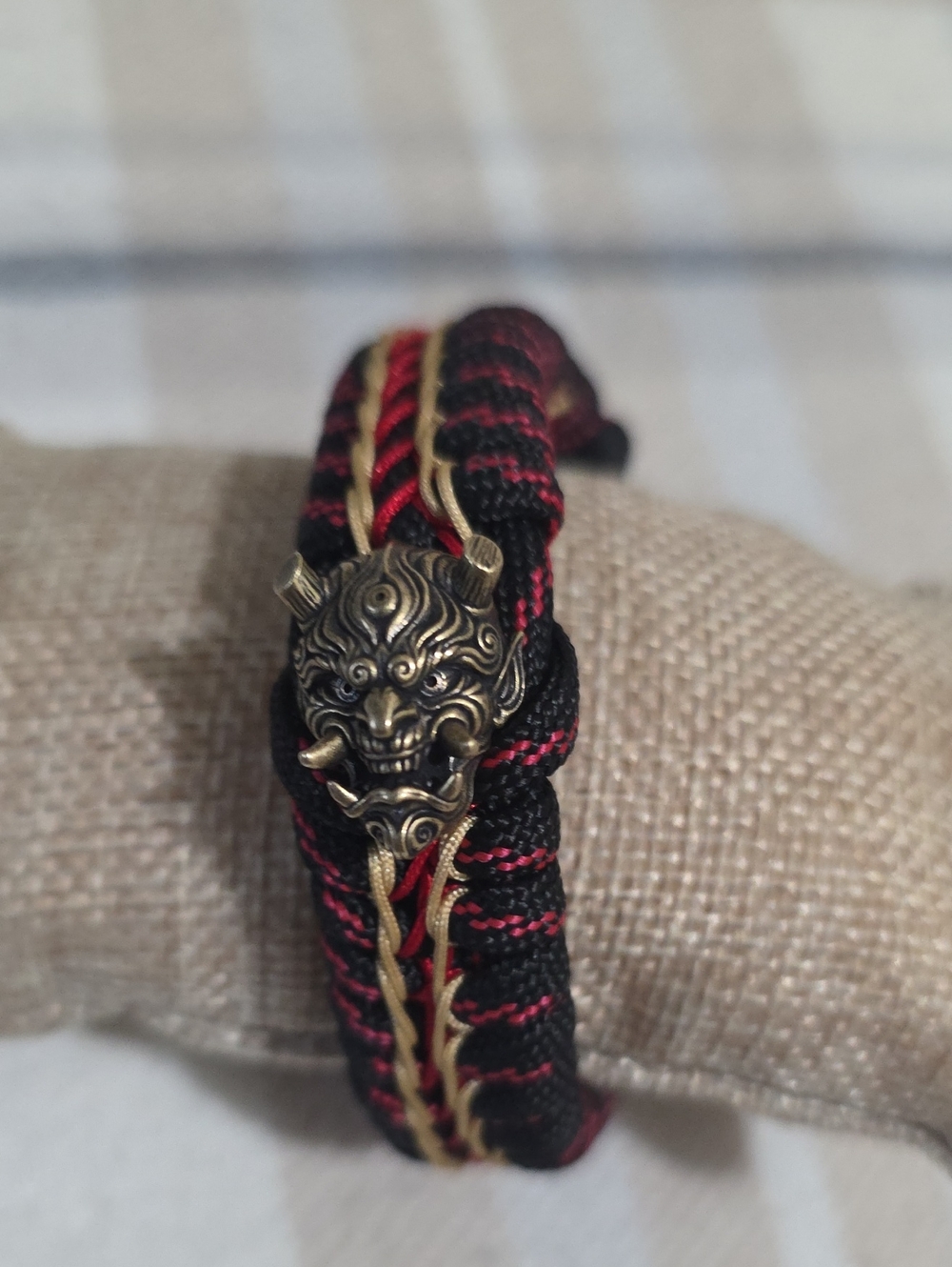 Black & Red Woven Men’s Bracelet with Antique Gold Demon Bead